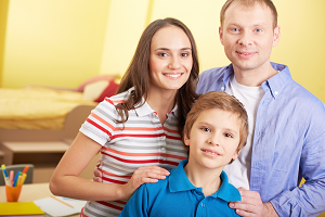 two parents with male student